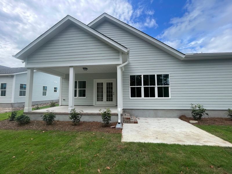 Representative exterior photo of a completed home built from the Lanai by Bill Clark Homes in The Sanctuary at Sunset Beach, Sunset Beach, NC (Image 32). Representative exterior photo of a completed home built from the Lanai by Bill Clark Homes in The Sanctuary at Sunset Beach, Sunset Beach, NC (Image 32).