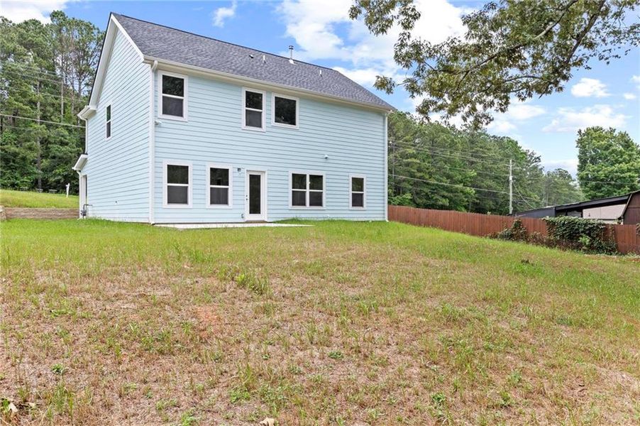 Front exterior of a new home in , Douglasville, GA, highlighting curb appeal (Image 2).