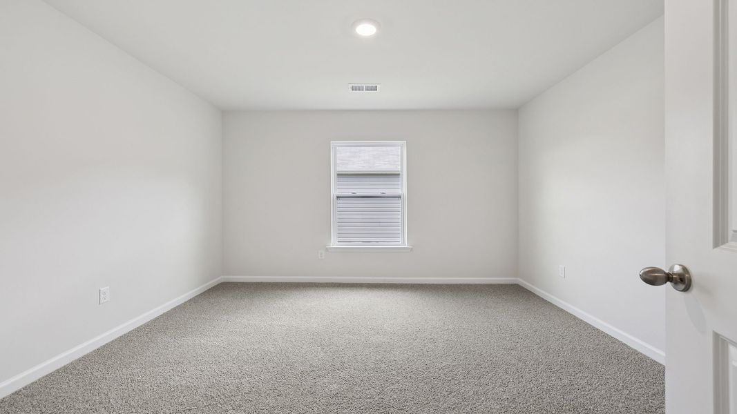 Spacious, unfurnished interior of a new home in Bentley Park, Greenwood (Image 18).