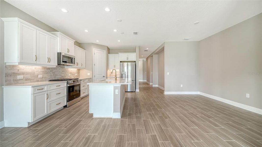 Furnished interior view inside a new home in Wildleaf at North River Ranch, Parrish (Image 6).