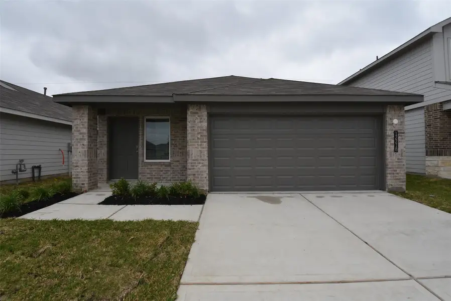 Front exterior of a new home in , Houston, TX, highlighting curb appeal (Image 24). Front exterior of a new home in , Houston, TX, highlighting curb appeal (Image 24).