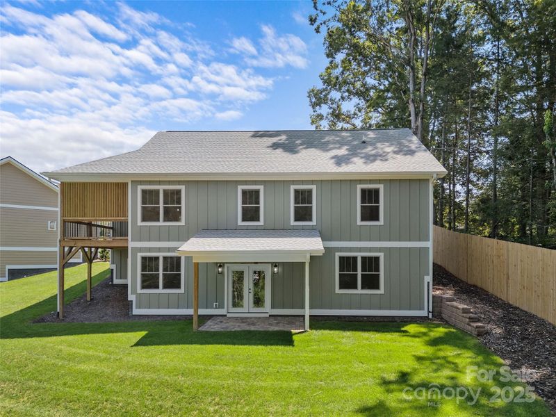 Front exterior of a new home in , Hendersonville, NC, highlighting curb appeal (Image 24).