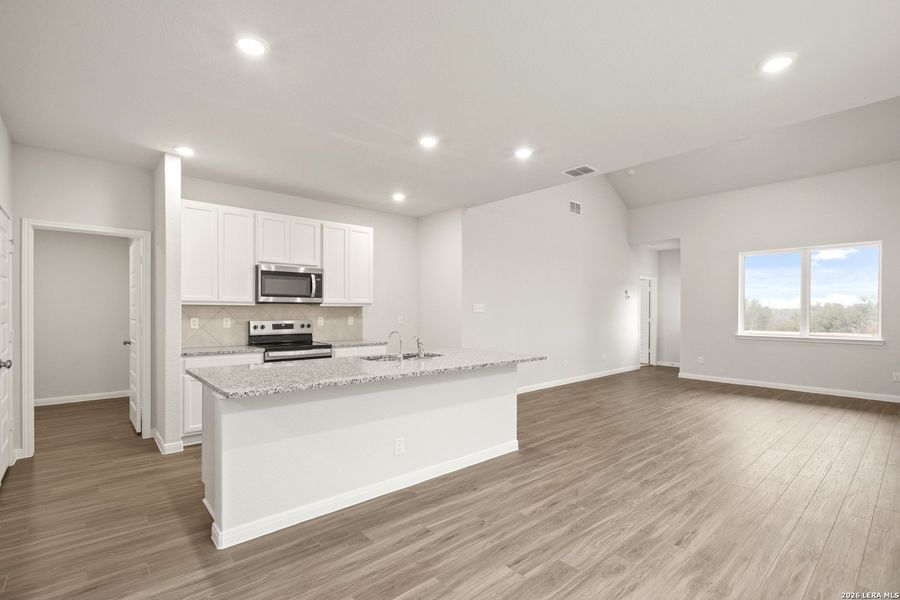 Furnished interior view inside a new home in Abbott Place, St. Hedwig (Image 7).