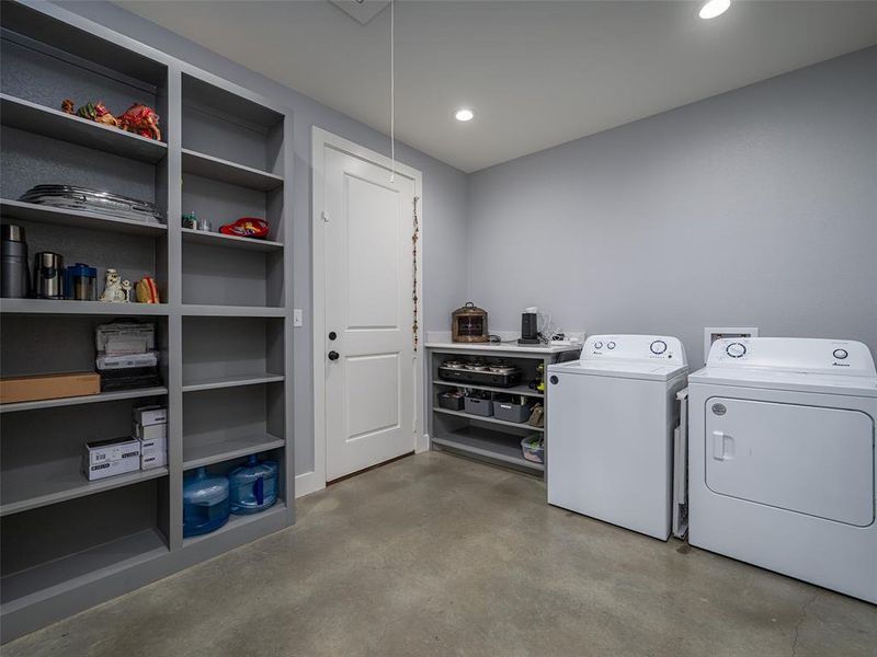 Laundry room with attic access, independent washer and dryer, and recessed lighting Laundry room with attic access, independent washer and dryer, and recessed lighting