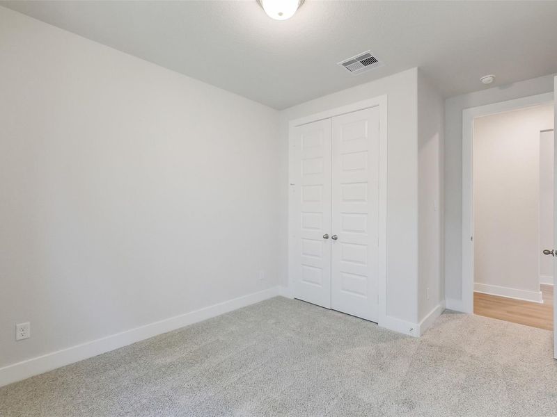 Spacious, unfurnished interior of a new home in Sunterra, Katy (Image 34).