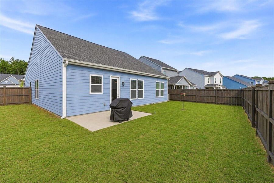 Exterior details and patio area of a home in Homecoming, Ravenel (Image 4). Exterior details and patio area of a home in Homecoming, Ravenel (Image 4).