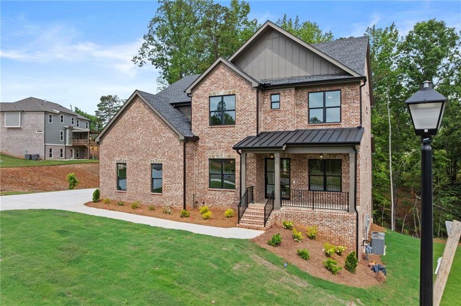 Front exterior of a new home in , Buford, GA, highlighting curb appeal (Image 27). Front exterior of a new home in , Buford, GA, highlighting curb appeal (Image 27).