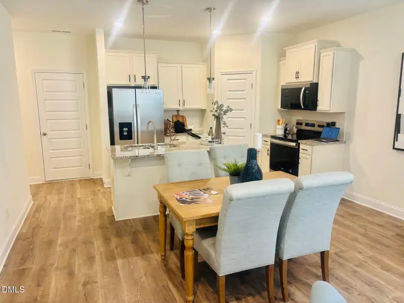 WOTH Model Staged Living Room to Kitchen