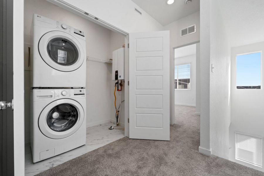 Representative exterior photo of a completed home built from the Telluride by Baessler Homes in Liberty Draw, Evans, CO (Image 37).