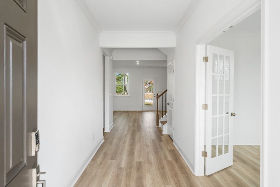 Representative unfurnished interior of a home built from the Ingram by Taylor Morrison in Falls Creek, Flowery Branch (Image 29).