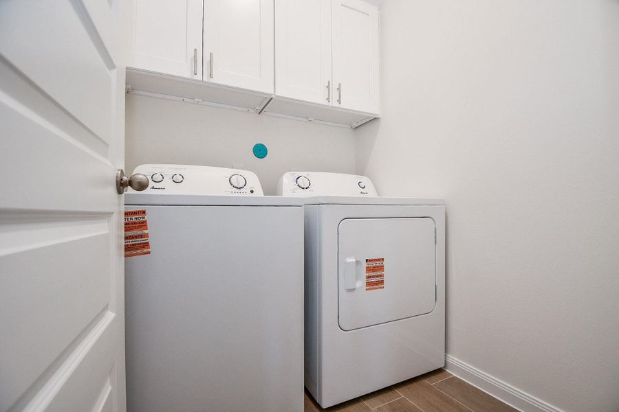 Utility room for laundry organization.