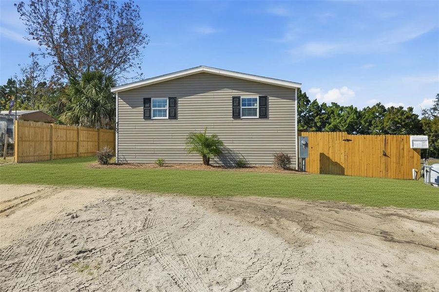 Exterior details and patio area of a home in , Brooksville (Image 26).