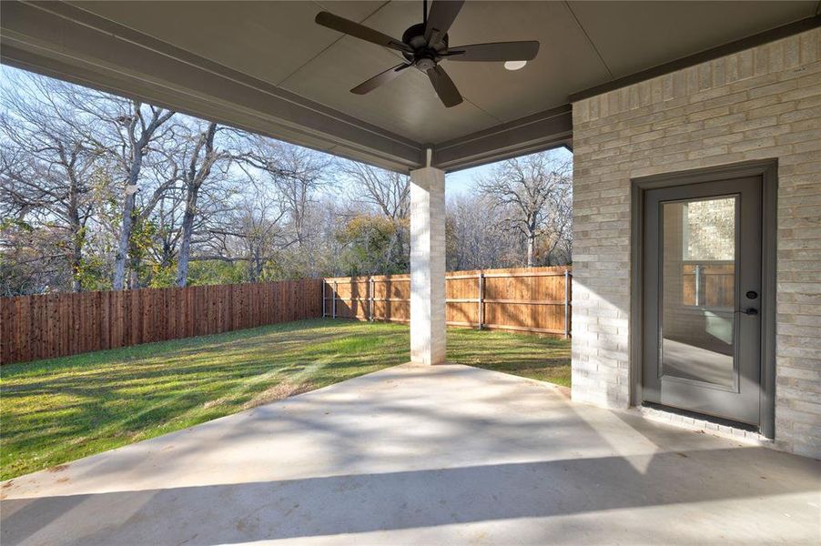 View of patio with ceiling fan