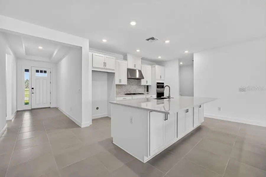 Furnished interior view inside a new home in Hammock at Two Rivers, Zephyrhills (Image 8).