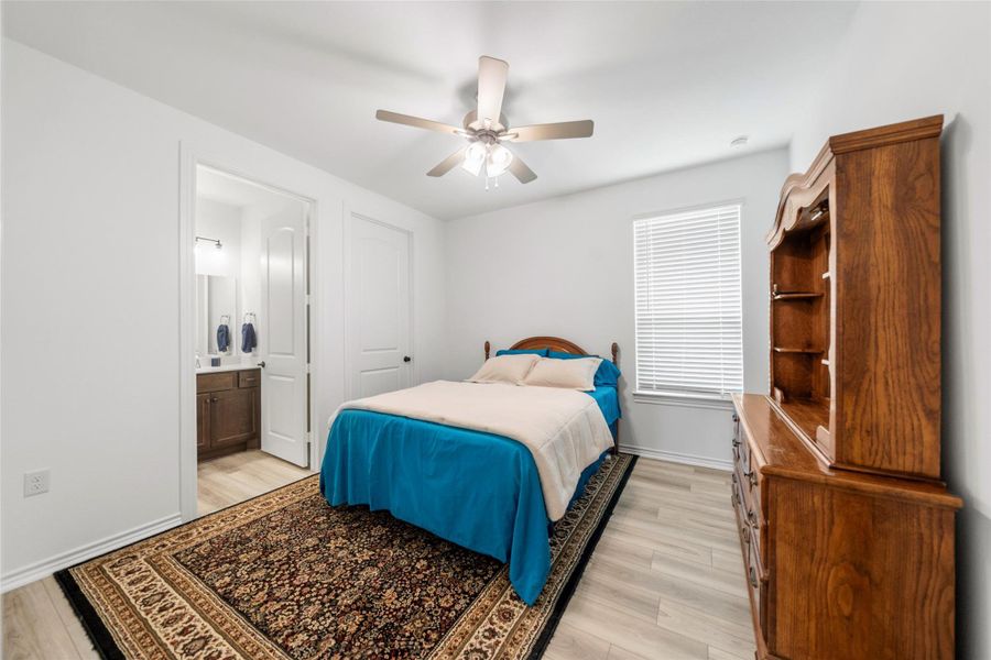 Second extra bedroom has natural light, ceiling fan, full bath and walk-in closet.