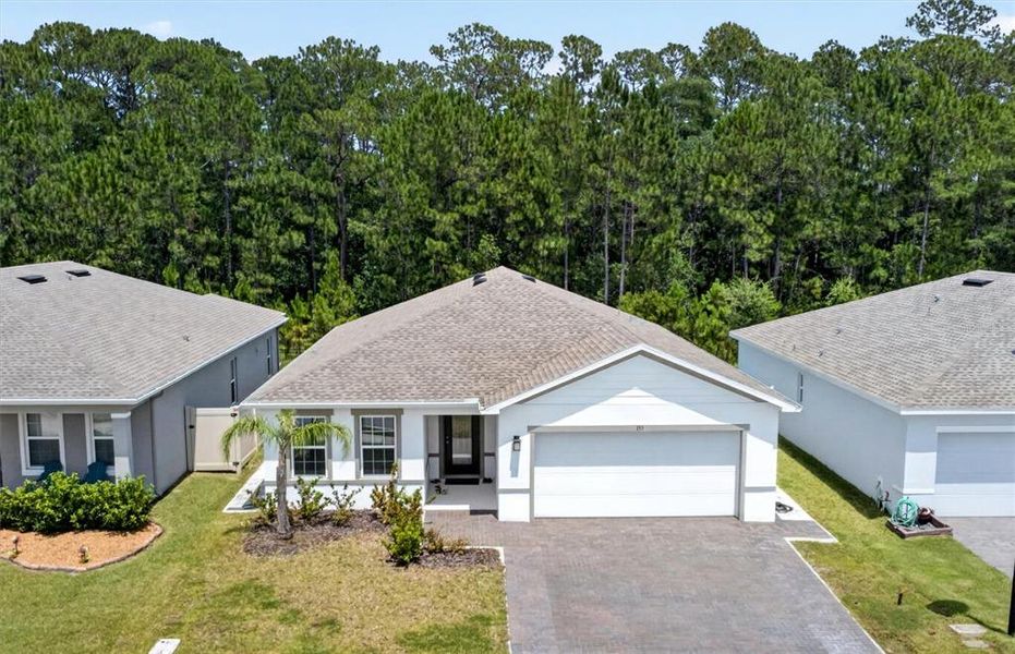 Front exterior of a new home in , Daytona Beach, FL, highlighting curb appeal (Image 28). Front exterior of a new home in , Daytona Beach, FL, highlighting curb appeal (Image 28).