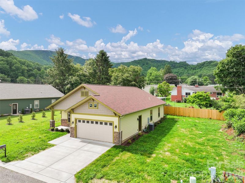 Front exterior of a new home in , Waynesville, NC, highlighting curb appeal (Image 19).