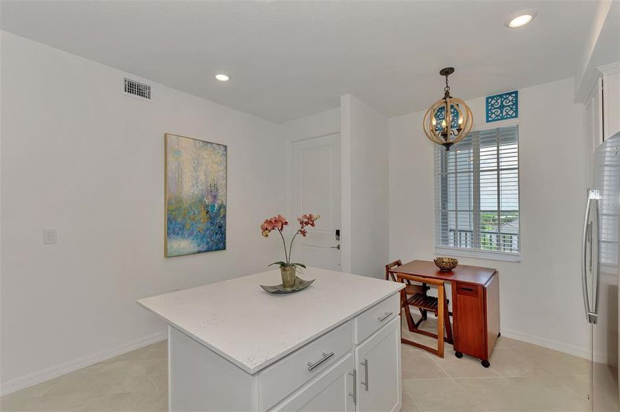 Furnished interior view inside a new home in Wellen Park Golf & Country Club, Venice (Image 8).