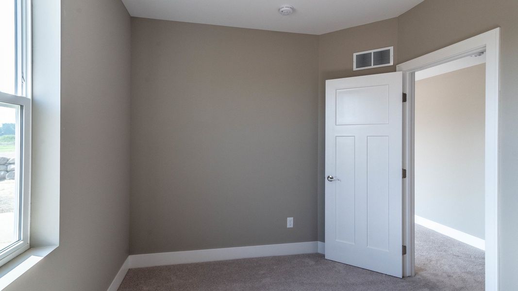 Representative unfurnished interior of a home built from the The Winslow by Norfolk Homes in Valleys, Jackson (Image 88).