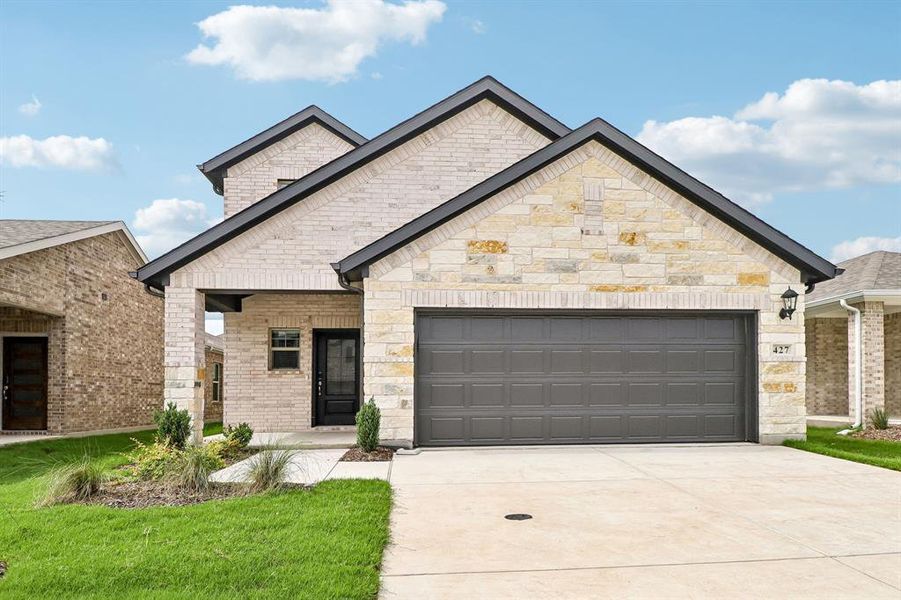 Front exterior of a new home in Southridge - Spring Series, Princeton, TX, highlighting curb appeal (Image 21).
