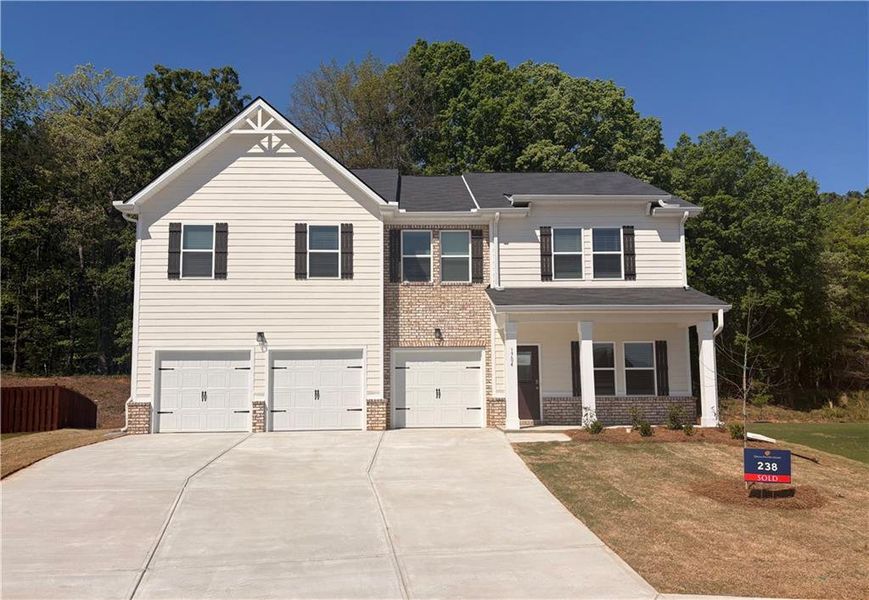 Front exterior of a new home in Southern Hills, McDonough, GA, highlighting curb appeal (Image 1). Front exterior of a new home in Southern Hills, McDonough, GA, highlighting curb appeal (Image 1).