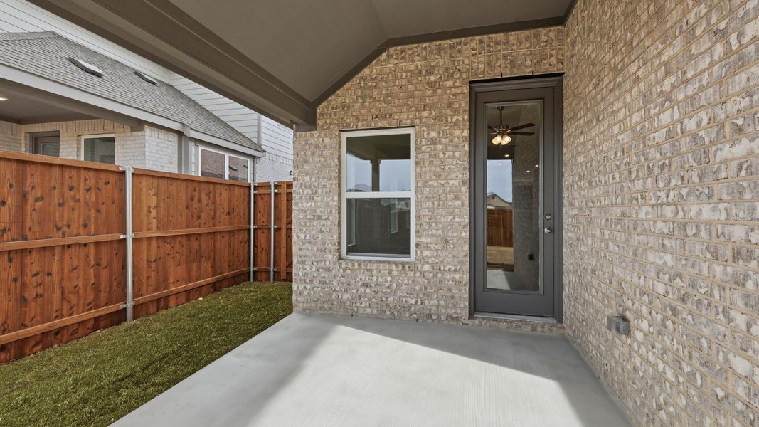 Exterior details and patio area of a home in Wildflower Ranch, Fort Worth (Image 21).