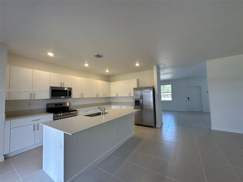 Furnished interior view inside a new home in Hawthorne at Galiano Pointe, Miami (Image 6).