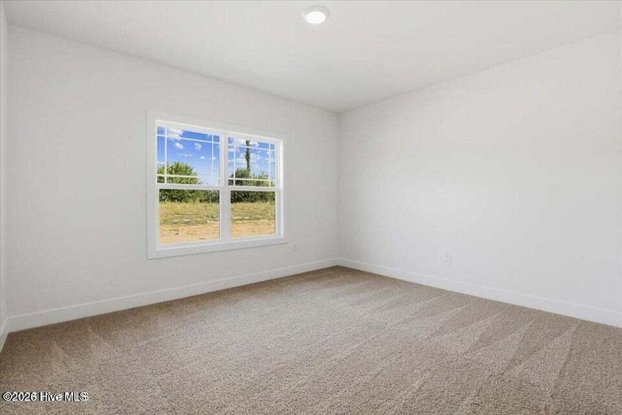 Spacious, unfurnished interior of a new home in Wood Creek Landing, Leland (Image 20). Spacious, unfurnished interior of a new home in Wood Creek Landing, Leland (Image 20).