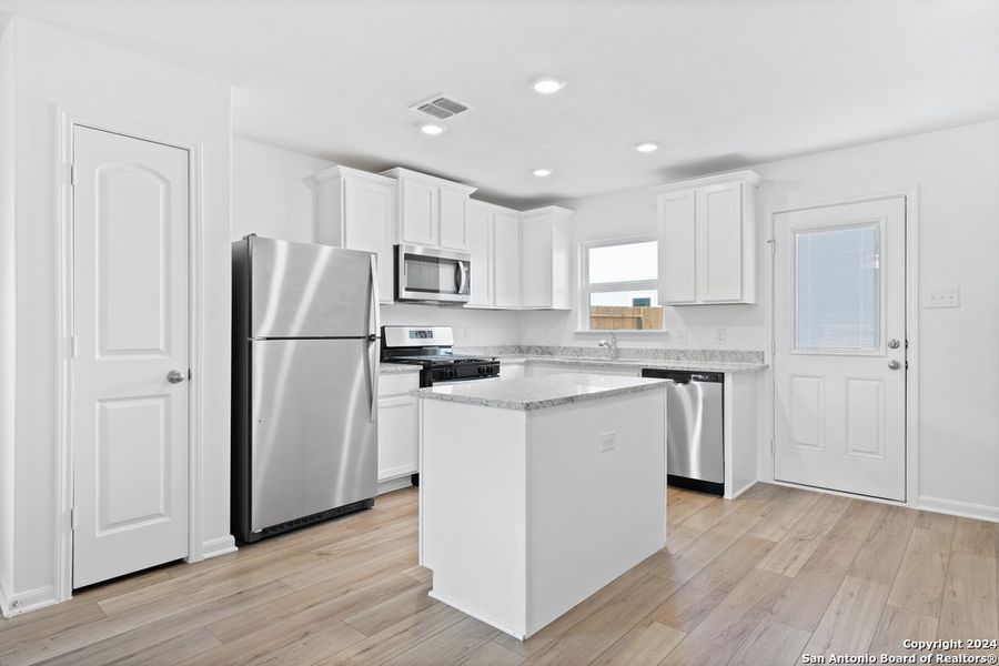 Furnished interior view inside a new home in Luckey Ranch, San Antonio (Image 6).
