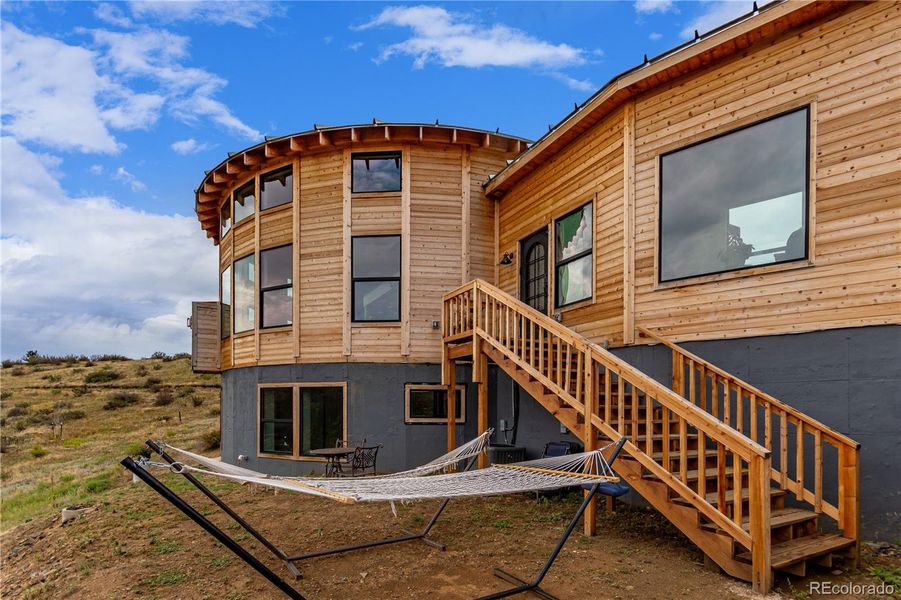 Front exterior of a new home in , Lyons, CO, highlighting curb appeal (Image 31).