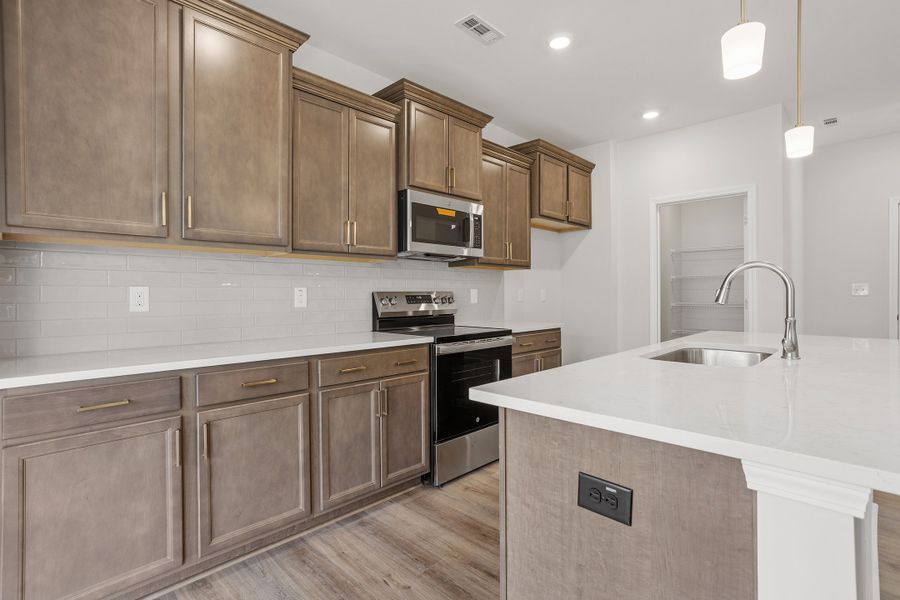 Furnished interior view inside a new home in Renaissance at White Oak, Garner (Image 7).