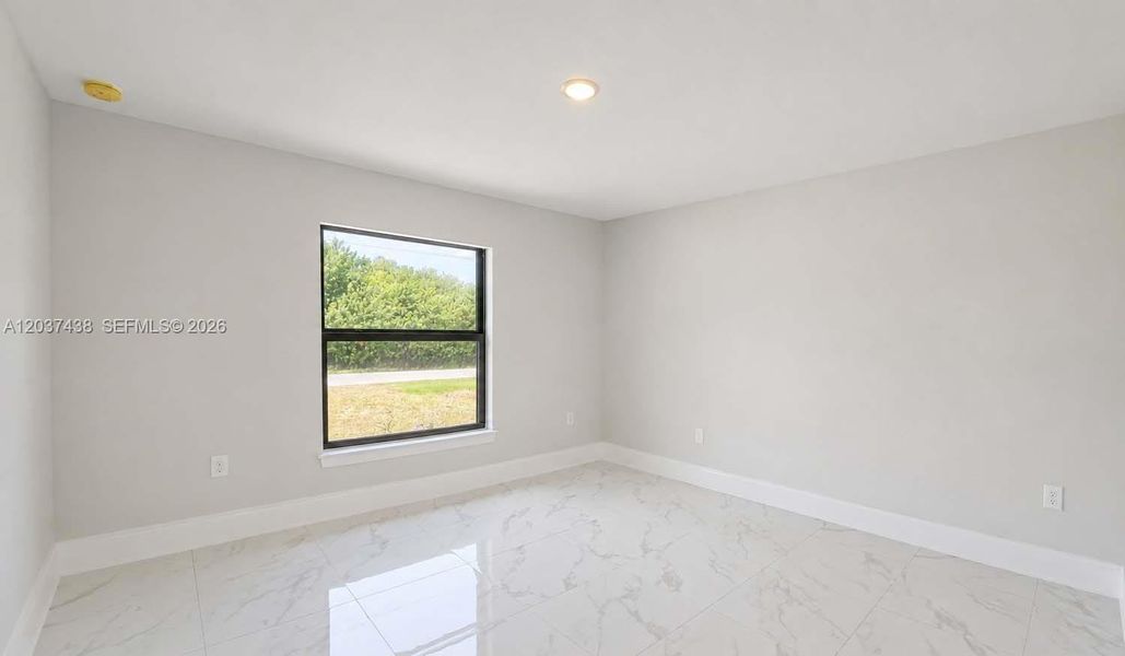 Spacious, unfurnished interior of a new home in , Lehigh Acres (Image 35).