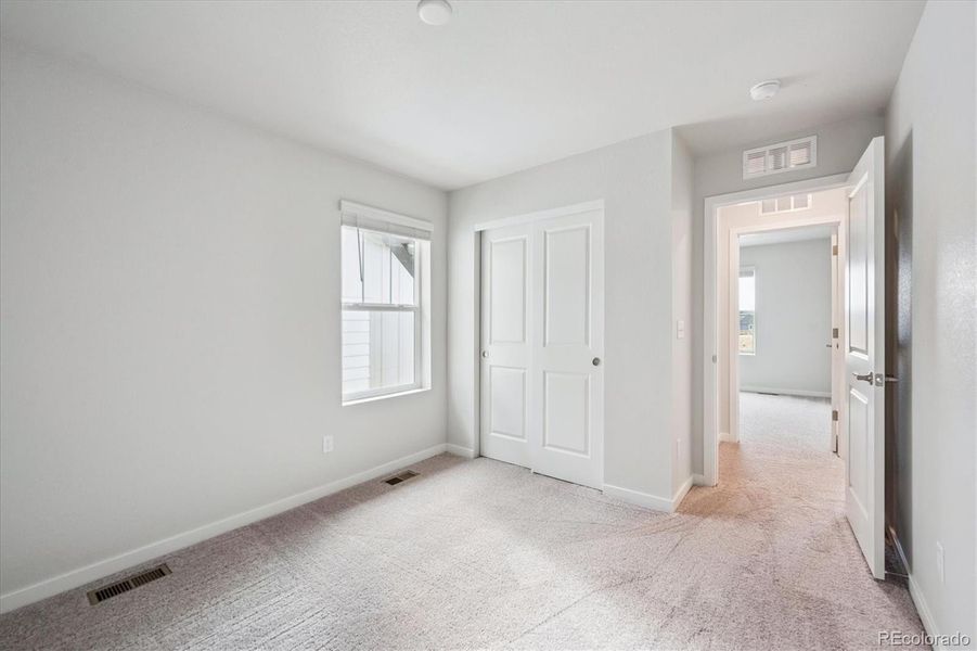 Spacious, unfurnished interior of a new home in Legato, Commerce City (Image 17).