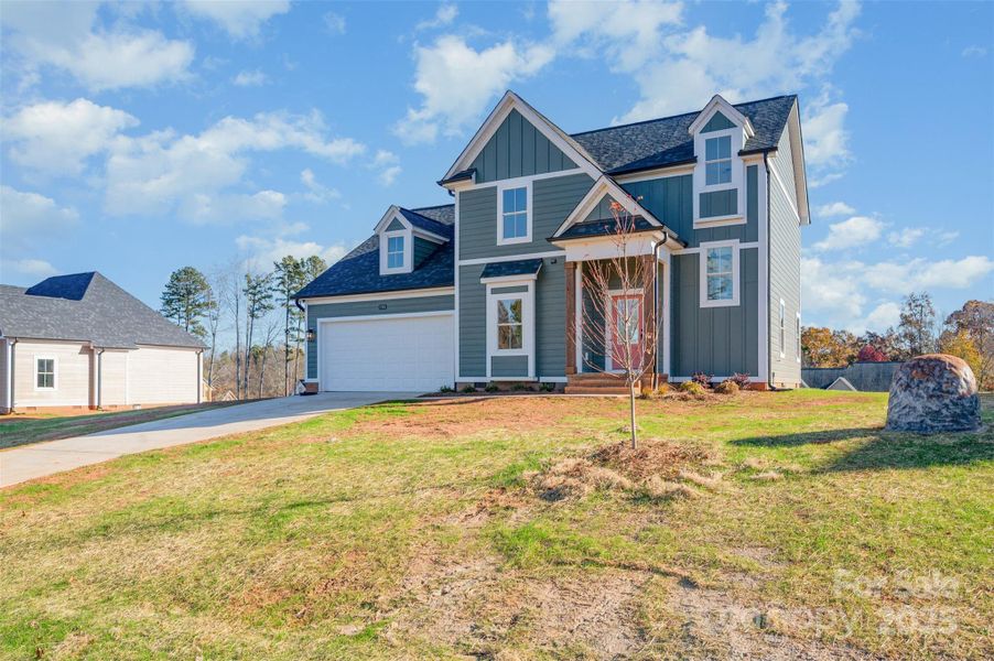 Front exterior of a new home in , China Grove, NC, highlighting curb appeal (Image 15).