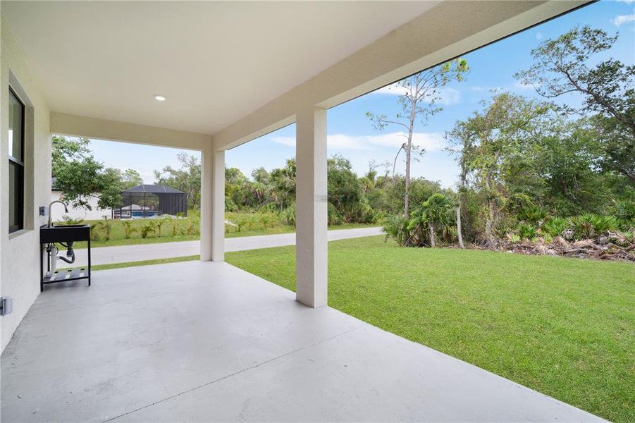Exterior details and patio area of a home in , Port Charlotte (Image 32).