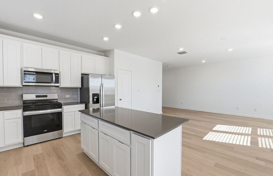 Furnished interior view inside a new home in Sunfield, Buda (Image 10).