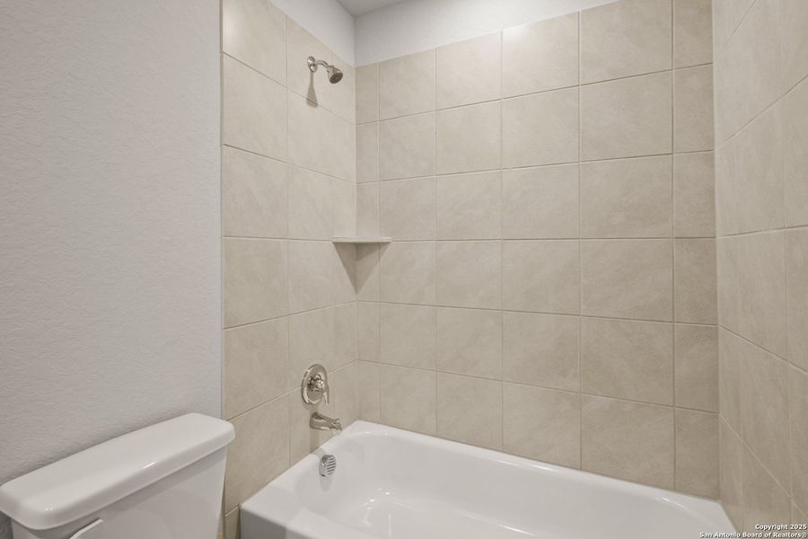 Furnished interior view inside a new home in Abbott Place, St. Hedwig (Image 6).