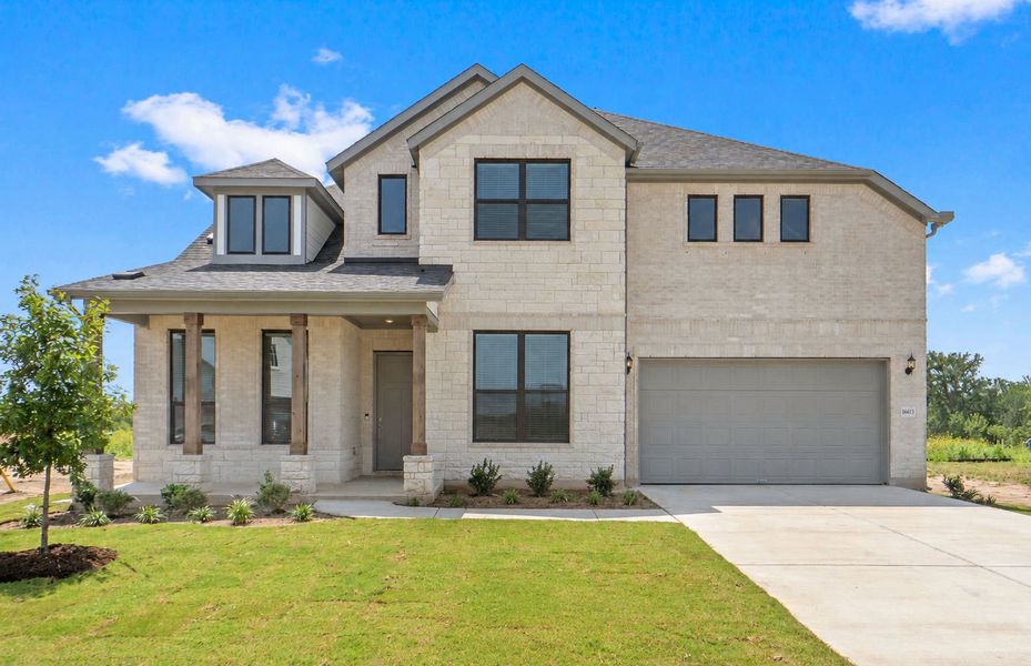 Representative exterior photo of a completed home built from the Ferris by Pulte Homes in Kuempel Estates, Pflugerville, TX (Image 28). Representative exterior photo of a completed home built from the Ferris by Pulte Homes in Kuempel Estates, Pflugerville, TX (Image 28).