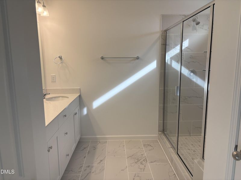 owner's bath with tile floors