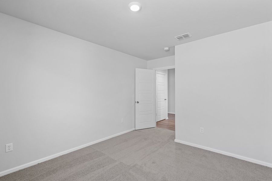 Representative unfurnished interior of a home built from the TEXAS CALI by D.R. Horton in Faculty Row, Abilene (Image 45).