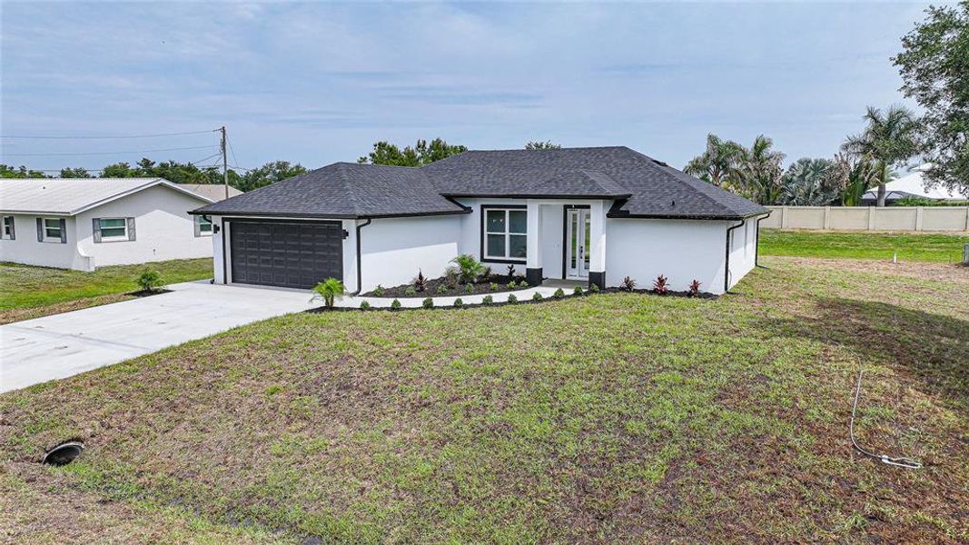 Front exterior of a new home in , Arcadia, FL, highlighting curb appeal (Image 27).