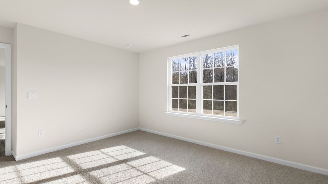 Representative unfurnished interior of a home built from the Freeport by D.R. Horton in Blair Ridge, La Grange (Image 8).