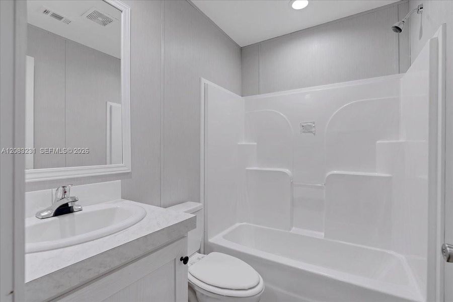 Furnished interior view inside a new home in , Clewiston (Image 5).
