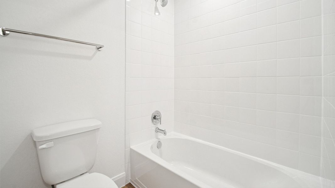 Furnished interior view inside a new home in Railhead, Cedar Creek (Image 9).