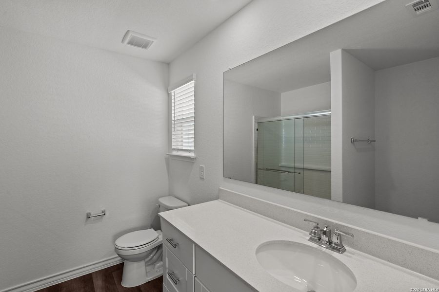 Furnished interior view inside a new home in Cinco Lakes, San Antonio (Image 5).