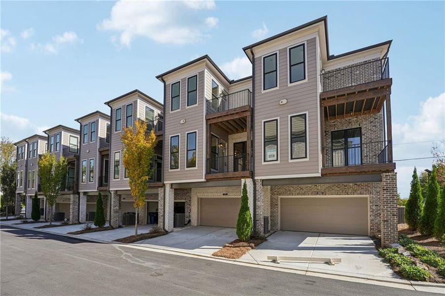 Front exterior of a new home in Towns on Thompson, Alpharetta, GA, highlighting curb appeal (Image 24).
