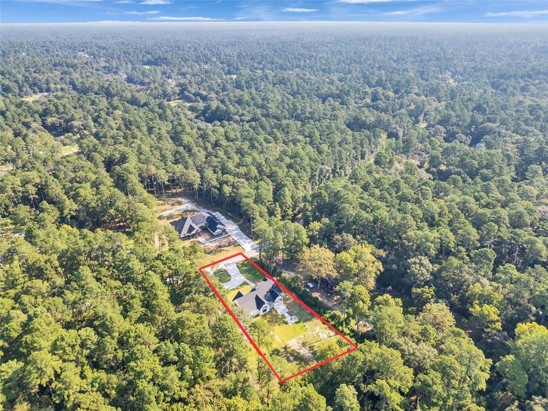 Front exterior of a new home in , Magnolia, TX, highlighting curb appeal (Image 28).