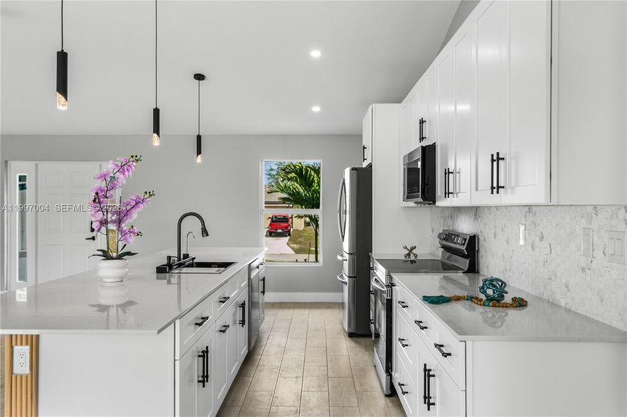 Modern black hardware for a refined coastal look!