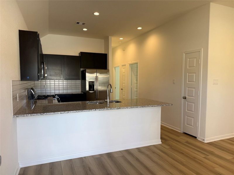 Furnished interior view inside a new home in East Gate Villas, Willis (Image 4).