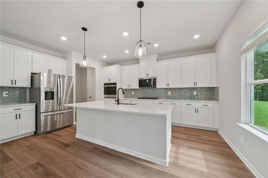 Furnished interior view inside a new home in Vines at Mill Creek - Estate Series, Braselton (Image 16).